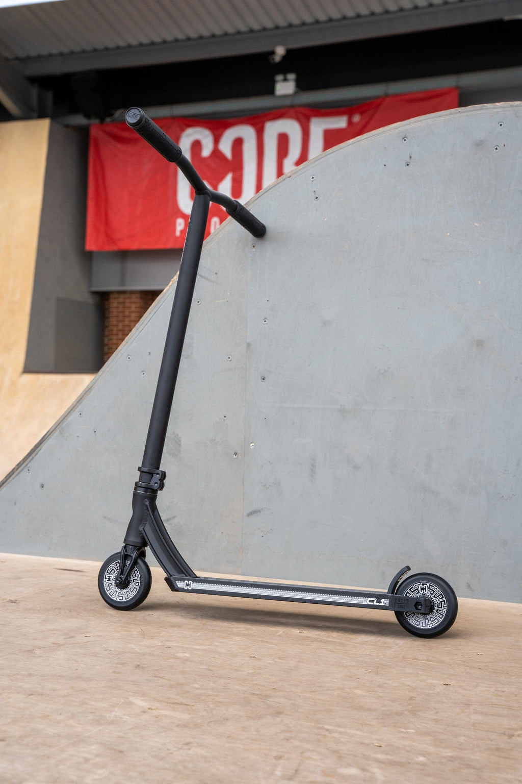 CORE CL1 Complete Stunt Scooter Black I Adult Stunt Scooter Leaning